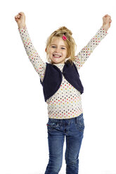 Winning blond little girl in front of white background - GDF000627