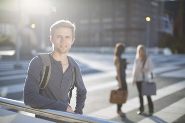 Portrait of young man on city square - ZEF001569