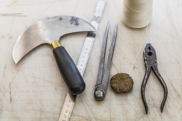 Tools on working surface in saddlery - TCF004336