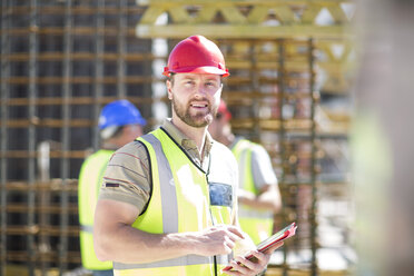 Portrait of construction worker in construction site - ZEF001593