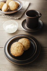 Cup of tea and plate with scones - EVGF001393