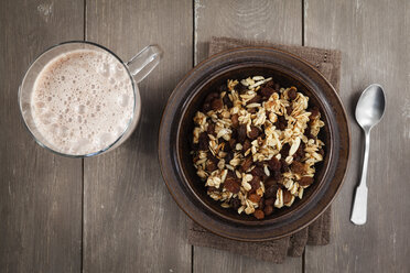 Plate of homemade granola and glass of cocoa - EVGF001407