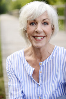 Portrait of smiling white haired senior woman - VRF000133