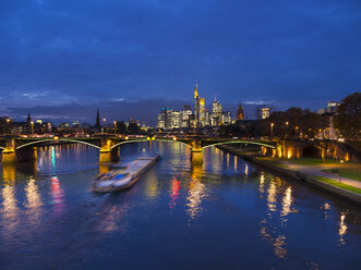Germany, Frankfurt, River Main with Ignatz Bubis Bridge, skyline of finanial district in background - AMF003407