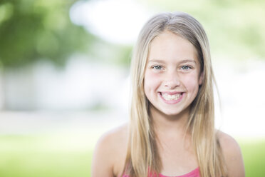 Portrait of smiling blond girl - ZEF002752