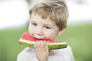 Portrait of little boy eating watermelon - ZEF002760