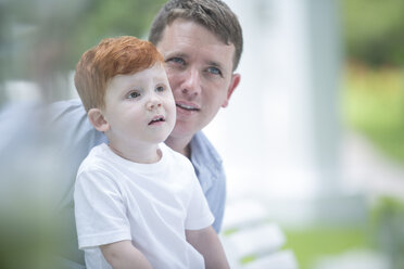 Red-haired boy with father outside - ZEF003460