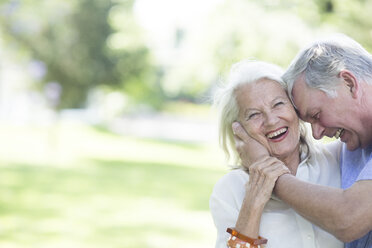 Happy senior couple outdoors - ZEF003487