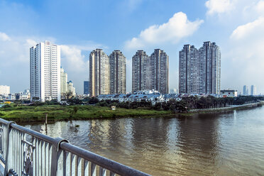 Vietnam, Ho Chi Minh City, branch of Saigon River and apartment tower complex - WEF000304