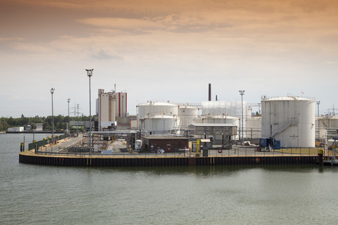 Germany, Ruhr area, Gelsenkirchen, gas tanks at industrial harbor stock photo