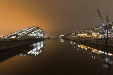 Germany, Hamburg, harbor, modern architecture at Dockland at night - RJF000368