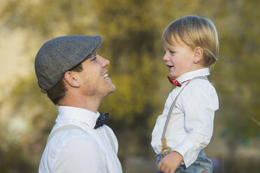 Happy father and son outdoors - JTLF000007