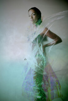 Young woman wrapped in rainbow foil - VEF000019