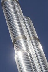 Arabia, United Arab Emirates, Dubai, View to Burj Khalifa in front of blue sky - JUNF000130