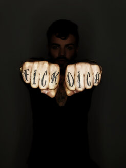 Fists with tatoos - STK001111