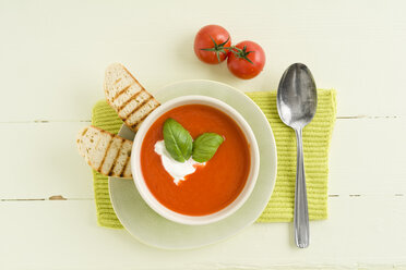 Tomato cream soup with baguette slice - ECF001621