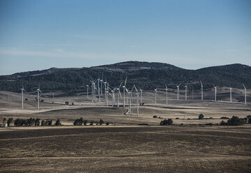 Spain, Andalusia, Tarifa, wind wheels on field - KBF000266