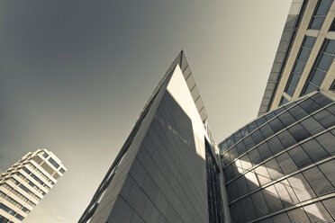 Germany, North Rhine-Westphalia, Wuppertal, view to modern office buildings from below - DWIF000359