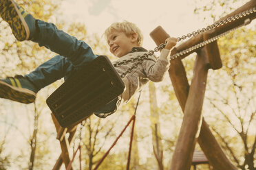 Toddler having fun on a swing - MFF001357