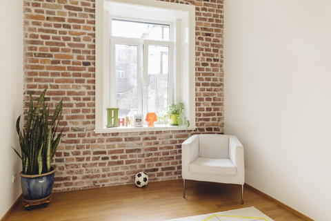 Room with brick wall in modern building stock photo