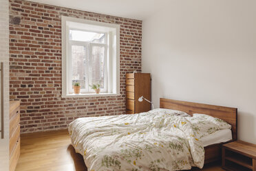 Bedroom in modern building with brick wall - MFF001367