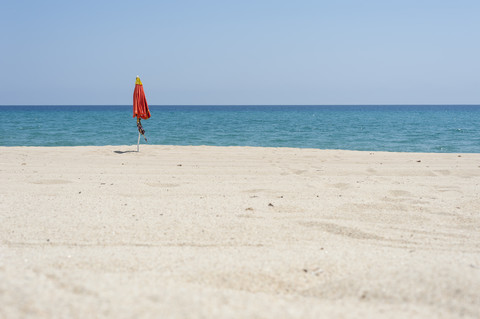 Italy, Sardinia, Ogliastra, Tortoli, sunshade at the beach stock photo