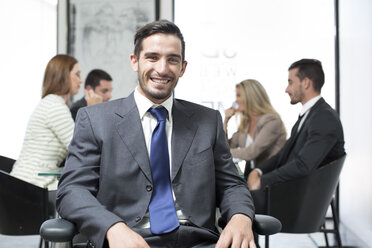 Portrait of confident businessman in boardroom - ZEF003113