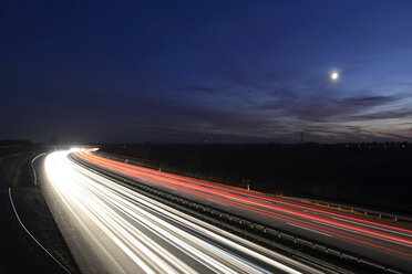 Germany, Berlin, motorway and light trails at night - BFRF000839