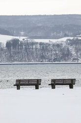 Germany, Lake Constance and benches in winter - JTF000612