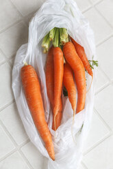 Fresh carrots in plastic bag - EVGF001096