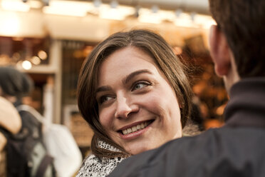 Germany, Cologne, portrait of smiling young woman - FEXF000243