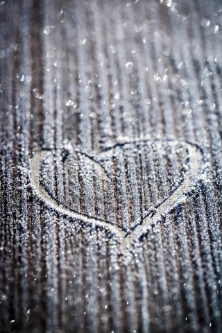 Germany, painted heart in frost stock photo