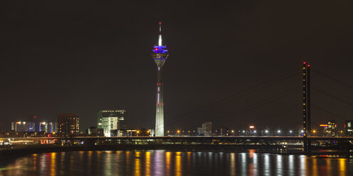 Germany, Duesseldorf, Rhine Tower and bridge at night - WIF001305