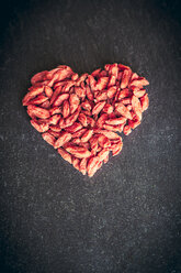 Wolfberries shaped like a heart on slate - SAR001245