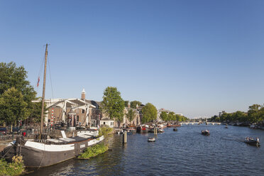 Netherlands, County of Holland, Amsterdam, Magere Brug, river Amstel with boats - GW003750