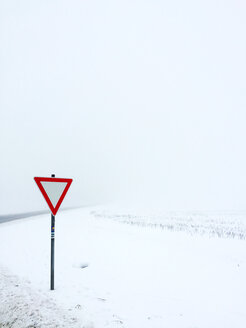 Give way sign in winter landscape - VRF000140
