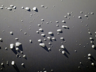 Hailstones on grey surface - JMF000312