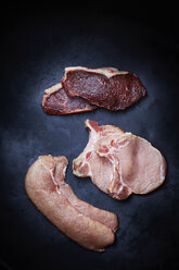 Raw pork chop, pork escalope and striploin steak - KSWF001370