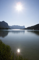 Austria, Upper Austria, Lake Mondsee, View to Drachenwand against the sun - WWF003444