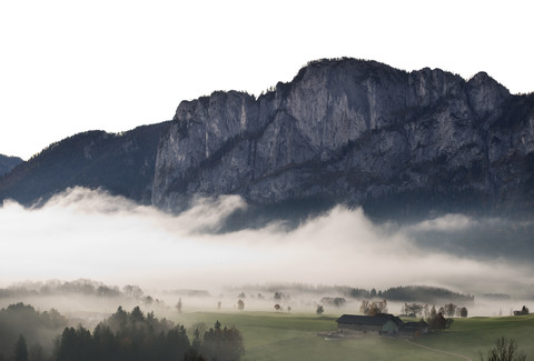 Austria, Mondsee, Drachenwand in morning mist stock photo