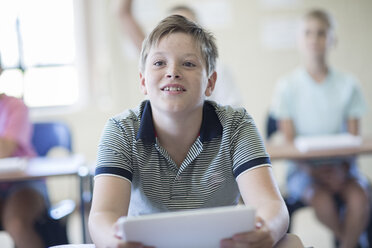 Smiling schoolboy in classroom - ZEF004909