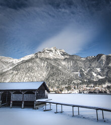 Austria, Tyrol, Achensee, boat house in winter - MKFF000161