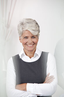 Portrait of smiling mature businesswoman - MFRF000003