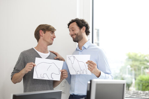 Two businessmen holding papers with bull and bear figure - MFRF000004