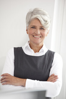 Portrait of smiling mature businesswoman - MFRF000008