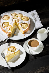 Home-baked apple pie and cup of white coffee - MAEF009681