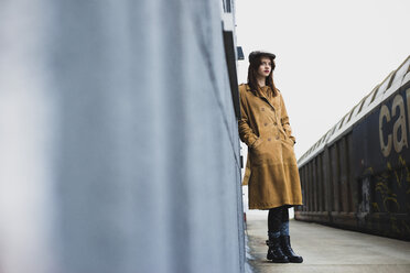 Young woman standing on platform - UUF003255