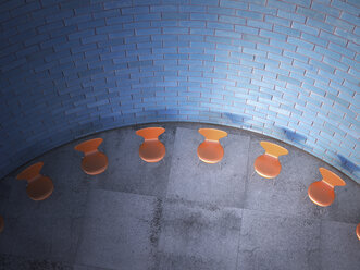 Chairs arranged in a circle in front of brick wall, 3D Rendering - UWF000363