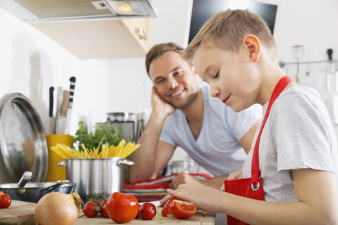 Father and son cooking together - PDF000690