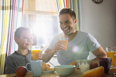 Father and son having breakfast together - PDF000734